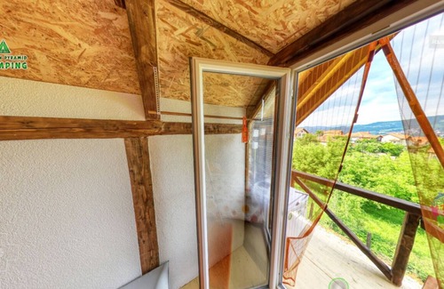 Visoko House | Orange bungalow Bosnian pyramid glamping