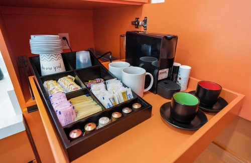 Greater East End Apartment | Orange Container @EADO Juice Box