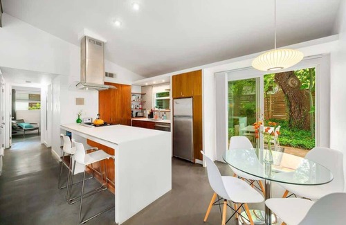South River City House | Orange Crush | SoCo Mid-Century Pet Retreat