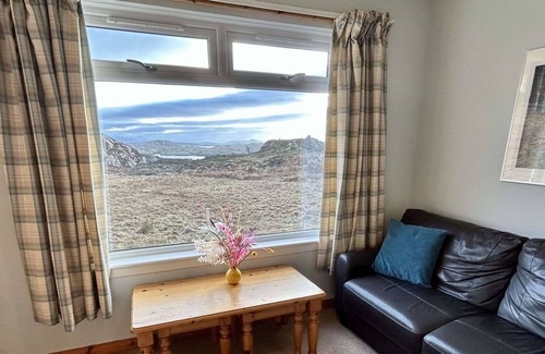 Clachtoll House | Orchid Cottage - sea and mountain views!
