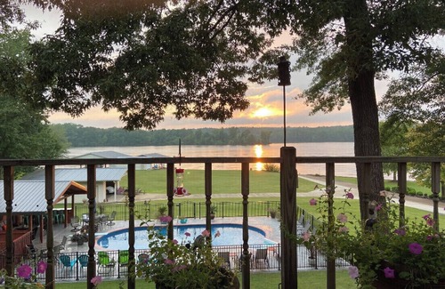 Huron Apartment | Outdoor family time on the patio, at the pool-pool house, or on the boat dock!