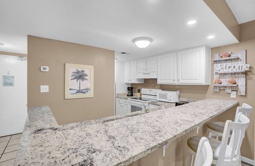 Coffeyville Condo | Outdoor Pool! | Gulf Front | Orange Beach, AL
