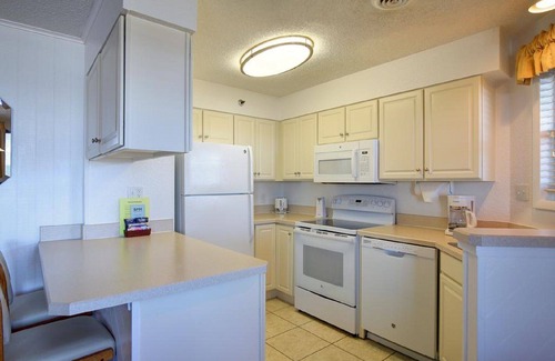Kill Devil Hills Resort | Outer Banks Beach Club charming oceanside resort with private beach and pools
