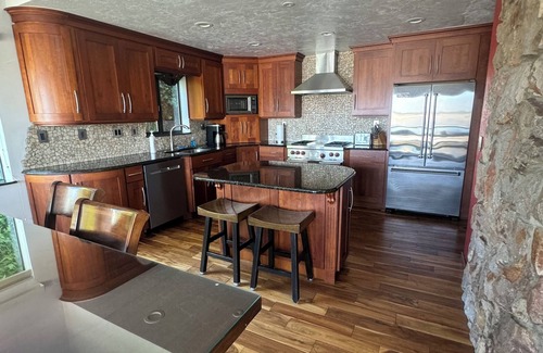 Winchester Bay House | Overlook the Winchester Bay Harbor from the spacious 3rd Level!