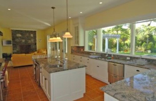 East Hampton House | OVERLOOKING THREE MILE HARBOR, DOUBLE-HEIGHT FOYER WITH CHANDELIER,.