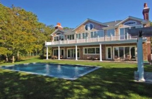 East Hampton House | OVERLOOKING THREE MILE HARBOR, DOUBLE-HEIGHT FOYER WITH CHANDELIER,.