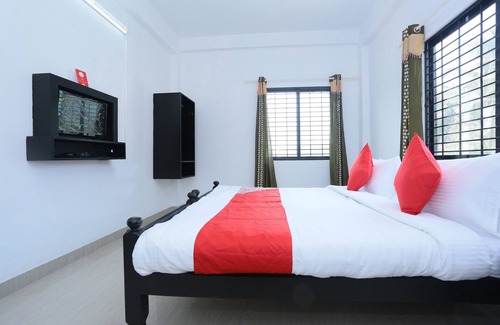 Panamaram Hotel | OYO 17186 Sunshine
