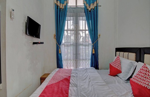 Pasir Pengaraian Hotel | OYO 92818 Penginapan Garuda Syariah