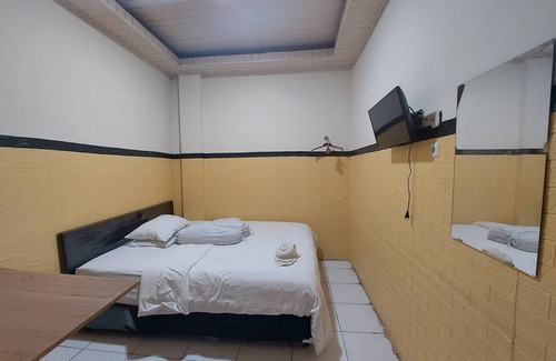 Kotaraja Hotel | OYO 93332 Kharis Home Stay