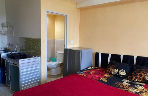 Pancawati Hotel | OYO 94083 Apartemen Podomoro Golf View Victory Rooms