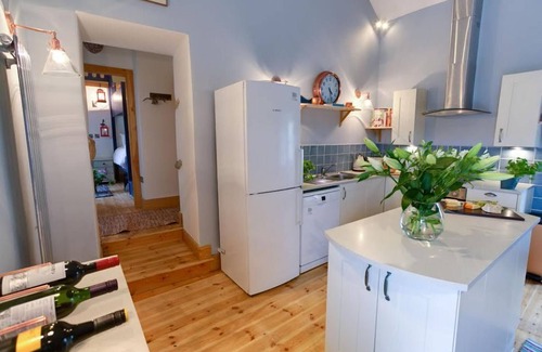 Llanfaethlu Apartment | Oyster Catcher - a ground floor bedroom that sleeps 6 guests in 3 bedrooms