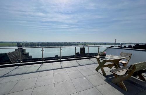 Emmerich Apartment | PANORAMA - Exklusives Apartment an der Promenade mit Dachterrasse & Rheinblick