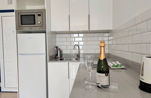 Puerto del Carmen Apartment | Panoramic sea views, sunny, private balcony, new kitchen & bathroom 2020