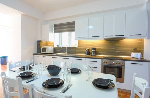Agios Stefanos Apartment | Paola House: Modernly designed property for 6, centrally in Saint Stefanos