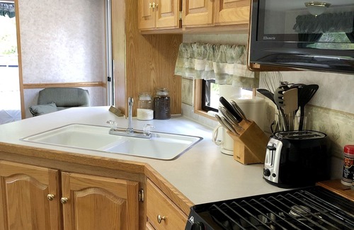 Garden Bay House | Park Model RV Glamping in Private Campground