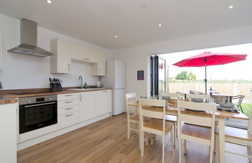Brynteg House | Pass the Keys | Modern Home with Hot Tub