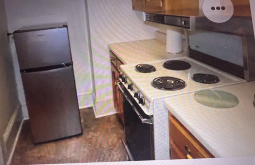 Anniston Apartment | Peace Apartment, upstairs with king size bed.