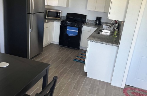 Dieppe Bay Town House | Peaceful 2-bedroom space with sea and Mountain View with WiFi, AC.