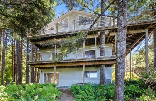Cape Meares Cottage | Peaceful 4BR Cape Meares Home | Ocean Views, Forest Setting, Wraparound Deck + King Bed