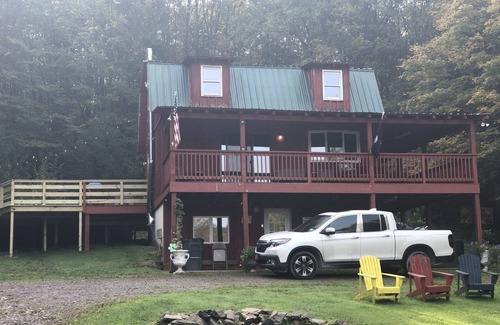 Walton House | Peaceful Cabin with Hot Tub, Game Room & Pond View