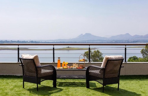 Igatpuri Villa | Pearl Lakeview Mansion by StayVista - Lakeside villa with Infinity pool, Jacuzzi, In-house theatre & Games room