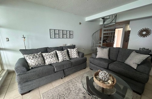 Stella Condo | Pelican Reef 703 Beachfront Penthouse with Ocean and Sunset Views