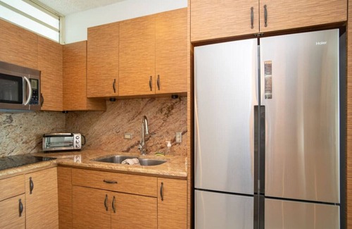Stella Condo | Pelican Reef 703 Beachfront Penthouse with Ocean and Sunset Views