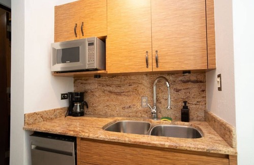 Stella Condo | Pelican Reef 703 Beachfront Penthouse with Ocean and Sunset Views
