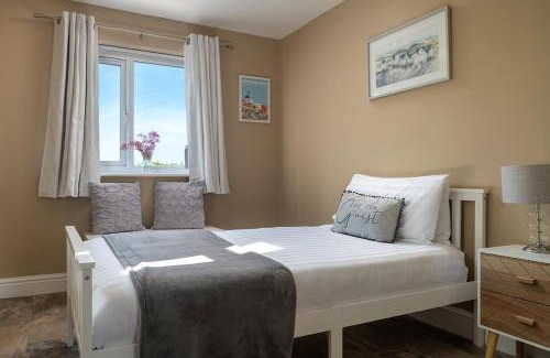 St George House | Pen y coed with hot tub and sauna surrounded by countryside views