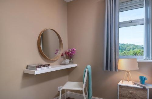 St George House | Pen y coed with hot tub and sauna surrounded by countryside views