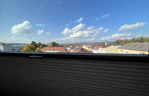 Roding Apartment | Penthouse above the rooftops with roof terrace and far-reaching views