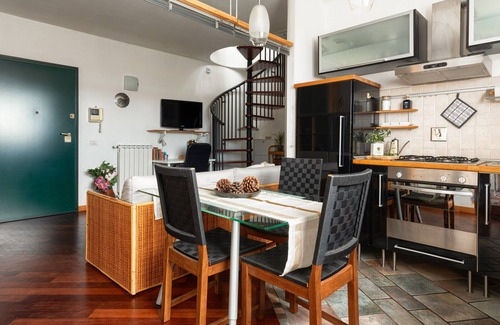 Novoli - San Donato Apartment | Penthouse Bliss: Sunlit Terrace & Authentic Tatami Bed