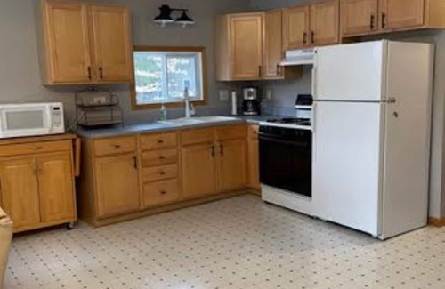 Pentwater House | Pentwater River Frontage Overlooking 100s of Wooded Acres