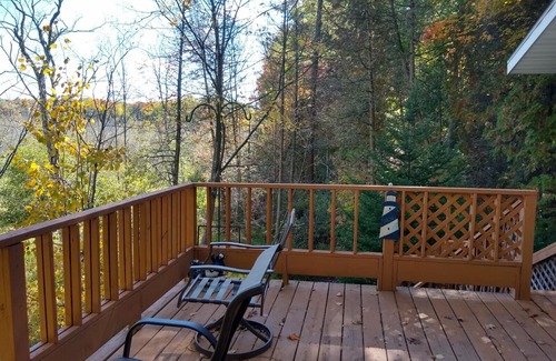 Pentwater House | Pentwater River Frontage Overlooking 100s of Wooded Acres