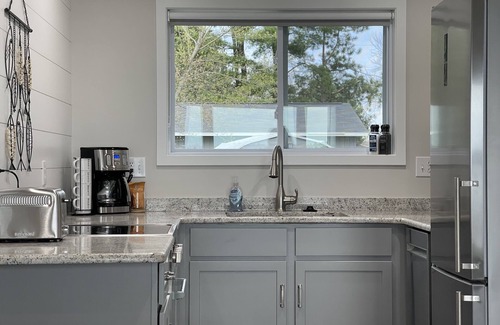 Lewiston House | Perfect location on East Twin Lake, walking distance to town! Unit #1