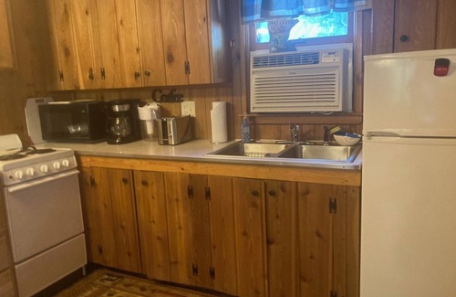Britt Cabin | Perfect place for your next stay: Vintage cabin, quiet lake, and a classic sauna