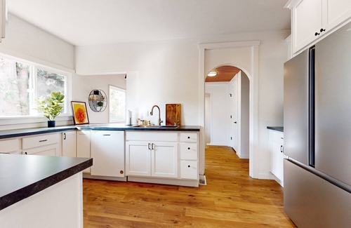 Cornwall Park House | Perfectly located home with open layout, well-equipped kitchen, smart TV, & W/D