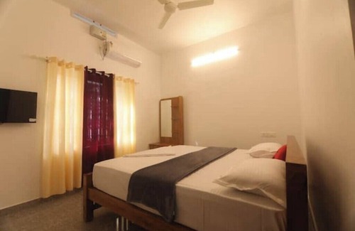 Thekkady Apartment | Periyar Homes Deluxe Room 101