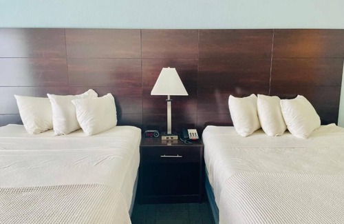 Cuero House | Pet-Friendly Double Queen Room at FairBridge Inn & Suites Cuero, Free Parking!