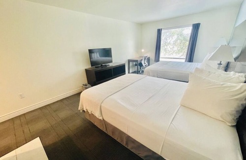 Cuero House | Pet-Friendly Double Queen Room at FairBridge Inn & Suites Cuero, Free Parking!