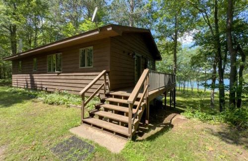 Iron River House | Pet-Friendly Lakefront Cabin by arc Vacation Rentals