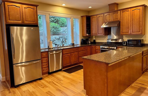 North Creek Apartment | Pet-friendly MIL apartment in quiet neighborhood with fenced dog yard