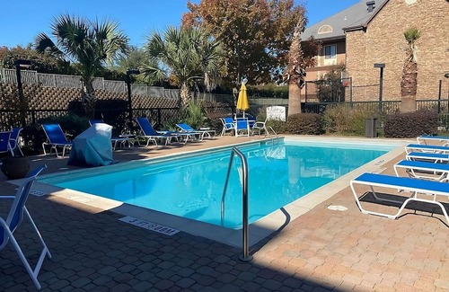 Las Colinas Apartment | Pet-friendly Property! w/Pool and Parking, Near Parmenter Gazebo Garden