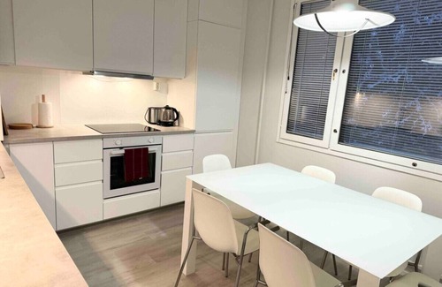 Koillinen District Condo | #PIHLAJISTO · Spacious 4-bedroom condo with patio, free parking