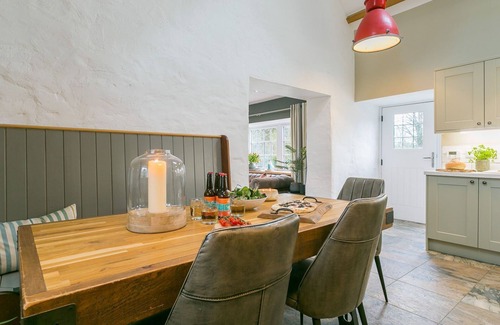 Bryngwran Cottage | Plas Coach House - a hot tub that sleeps 6 guests in 3 bedrooms