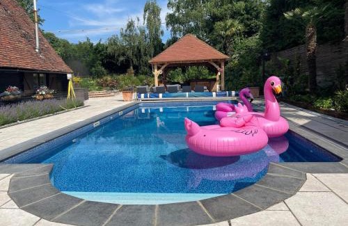 Sheldwich House | Plum Pudding Barn - private heated pool, hot tub & kids play area