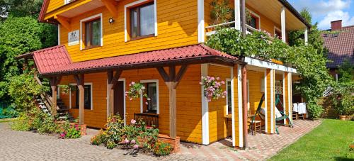 Suprasl Apartment | pokoje wypoczynkowe "Róża"