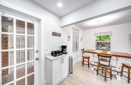 Coral Ridge Apartment | Pool! Coastal Beach Getaway! Walk 2 Beach+Shops!