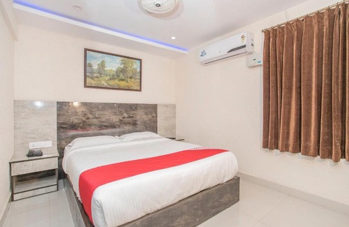 Kollur Hotel | POP Hotel Jaganmatha Orchids