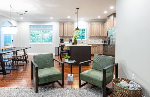 Ashley Oaks House | Porch Paradise~ Hot Tub~ Putting Lounge~ Sleeps 12